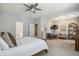 Spacious main bedroom features neutral walls, soft carpet, and an airy sitting area at 243 Retreat Ln, Canton, GA 30114