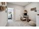 Office features soft carpet, neutral walls, and view to the bedroom at 243 Retreat Ln, Canton, GA 30114