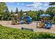 Community playground with slides, climbing structures, and swings for outdoor fun at 243 Retreat Ln, Canton, GA 30114