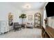 Comfortable sitting area features lots of light, soft carpet, and cozy furniture at 243 Retreat Ln, Canton, GA 30114