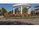 Welcome to Smyrna Market Village: grand entrance with lush landscaping and charming architecture at 2467 Davis Se Dr, Smyrna, GA 30080