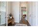 Hallway featuring hardwood floors, neutral walls, and a view into the living room at 2467 Davis Se Dr, Smyrna, GA 30080