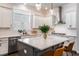 This kitchen features a large island, white cabinets, and stainless steel appliances at 2467 Davis Se Dr, Smyrna, GA 30080