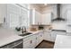 This kitchen features white cabinets, white countertops, and stainless steel appliances at 2467 Davis Se Dr, Smyrna, GA 30080