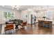 Spacious living room connected to the kitchen, featuring modern finishes and ample natural light at 2467 Davis Se Dr, Smyrna, GA 30080