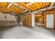 Unfinished basement with exposed beams, ductwork, concrete floor, and some framed rooms at 5510 Conway Dr, Marietta, GA 30068