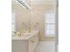 Bathroom with dual sinks, a large mirror and neutral decor at 5510 Conway Dr, Marietta, GA 30068