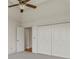Bedroom with ceiling fan, closet with bi-fold doors, neutral carpet at 5510 Conway Dr, Marietta, GA 30068