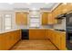 Bright and spacious kitchen with wood cabinetry, light countertops, and a central sink at 5510 Conway Dr, Marietta, GA 30068