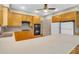 Kitchen with an island, a gas range, white countertops, and stainless steel appliances at 5510 Conway Dr, Marietta, GA 30068