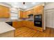Bright kitchen featuring wood cabinetry, stainless steel appliances, and light counter tops at 5510 Conway Dr, Marietta, GA 30068