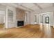 Spacious living room features hardwood floors, fireplace, and view to foyer at 5510 Conway Dr, Marietta, GA 30068