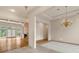 Open living room with hardwood floors, fireplace, and ample natural light at 5510 Conway Dr, Marietta, GA 30068