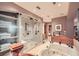 Large bathroom with a jetted tub, separate shower, and plenty of storage at 147 15Th Ne St # 16C, Atlanta, GA 30309
