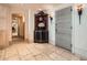 Grand entryway featuring stone floors, custom storage, and ornate sconces at 147 15Th Ne St # 16C, Atlanta, GA 30309