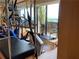Exercise room with a variety of equipment and floor-to-ceiling windows offering stunning views at 147 15Th Ne St # 16C, Atlanta, GA 30309