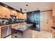 Updated kitchen features granite counters, stainless appliances, and lots of storage in light cabinets at 147 15Th Ne St # 16C, Atlanta, GA 30309