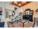 Elegant living area with travertine floors, staircase, and ornate decor at 147 15Th Ne St # 16C, Atlanta, GA 30309