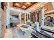 Sophisticated living room featuring a custom ceiling, designer seating, and elegant decor at 147 15Th Ne St # 16C, Atlanta, GA 30309