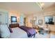 Comfortable bedroom with a large window providing natural light and views of the landscape at 147 15Th Ne St # 16C, Atlanta, GA 30309