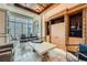 Bright office space featuring elegant stone floors, built-in storage, and large windows with city views at 147 15Th Ne St # 16C, Atlanta, GA 30309