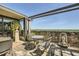 Relaxing outdoor patio featuring a stone wall and scenic views, creating a serene and inviting atmosphere at 147 15Th Ne St # 16C, Atlanta, GA 30309