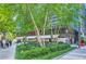 Restaurant exterior with modern design, greenery, and outdoor seating, perfect for attracting customers at 147 15Th Ne St # 16C, Atlanta, GA 30309
