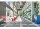 Inviting walkway with colorful seating, landscaping, and modern architecture providing a lively and pedestrian-friendly environment at 147 15Th Ne St # 16C, Atlanta, GA 30309