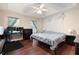Spacious bedroom with plush carpet, natural light, and a comfortable bed at 174 Cannon Pl, Dallas, GA 30157