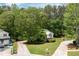 Landscaped front yard and mature trees enhance the curb appeal of this charming home at 174 Cannon Pl, Dallas, GA 30157