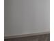 This bedroom has neutral carpeting and a grey baseboard at 1810 Forkview Ct, Lawrenceville, GA 30044