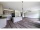 Bright and airy open-concept living area with modern fixtures and flooring at 1810 Forkview Ct, Lawrenceville, GA 30044