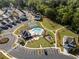 Beautiful aerial view of the community pool, tennis courts, playground, and well-manicured lawns at 3747 Silvery Way, Powder Springs, GA 30127