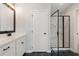 Bathroom with modern vanity, glass shower with marble, and stylish tile at 3747 Silvery Way, Powder Springs, GA 30127