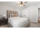 Bedroom boasts neutral tones, ceiling fan, and stylish accents at 3747 Silvery Way, Powder Springs, GA 30127