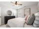 Bedroom boasts neutral tones, ceiling fan, and stylish accents at 3747 Silvery Way, Powder Springs, GA 30127