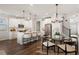 Modern kitchen featuring white cabinets, stainless appliances, and a center island at 3747 Silvery Way, Powder Springs, GA 30127