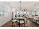 Bright living room with wood floors, modern lighting, and comfortable seating at 3747 Silvery Way, Powder Springs, GA 30127