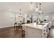 Bright and airy living space combining a kitchen, dining area, and a cozy living room at 3747 Silvery Way, Powder Springs, GA 30127