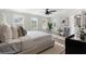 Bright and spacious main bedroom with natural light, seating, and decor at 3747 Silvery Way, Powder Springs, GA 30127