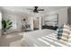 Comfortable main bedroom with natural light, stylish furnishings, and art at 3747 Silvery Way, Powder Springs, GA 30127