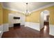 Charming dining area with hardwood floors, stylish chandelier, and easy access to kitchen at 3940 Village Estates Ct, Cumming, GA 30040