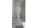 Small bathroom with toilet and tile flooring, painted in neutral color at 4185 Brookwood Dr, Austell, GA 30106