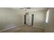 Neutral bedroom with ceiling fan, carpet flooring, and two closets at 4185 Brookwood Dr, Austell, GA 30106