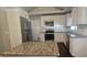 Bright kitchen with white cabinets, granite countertops, stainless appliances, and large kitchen island at 4185 Brookwood Dr, Austell, GA 30106