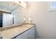 Clean bathroom featuring a granite countertop vanity, ample lighting, and shower and tub combo at 4835 Merlendale Ct, Atlanta, GA 30327