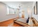 Bright bedroom with hardwood floors, ample natural light, and modern decor at 4835 Merlendale Ct, Atlanta, GA 30327