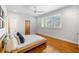 Comfortable bedroom with hardwood floors, a ceiling fan, and ample natural light at 4835 Merlendale Ct, Atlanta, GA 30327