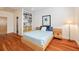 Cozy bedroom with hardwood floors, built in shelving, and ample natural light at 4835 Merlendale Ct, Atlanta, GA 30327