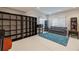 Bonus room with a sitting area and built-in shelves, offering versatile space for relaxation or hobbies at 4835 Merlendale Ct, Atlanta, GA 30327